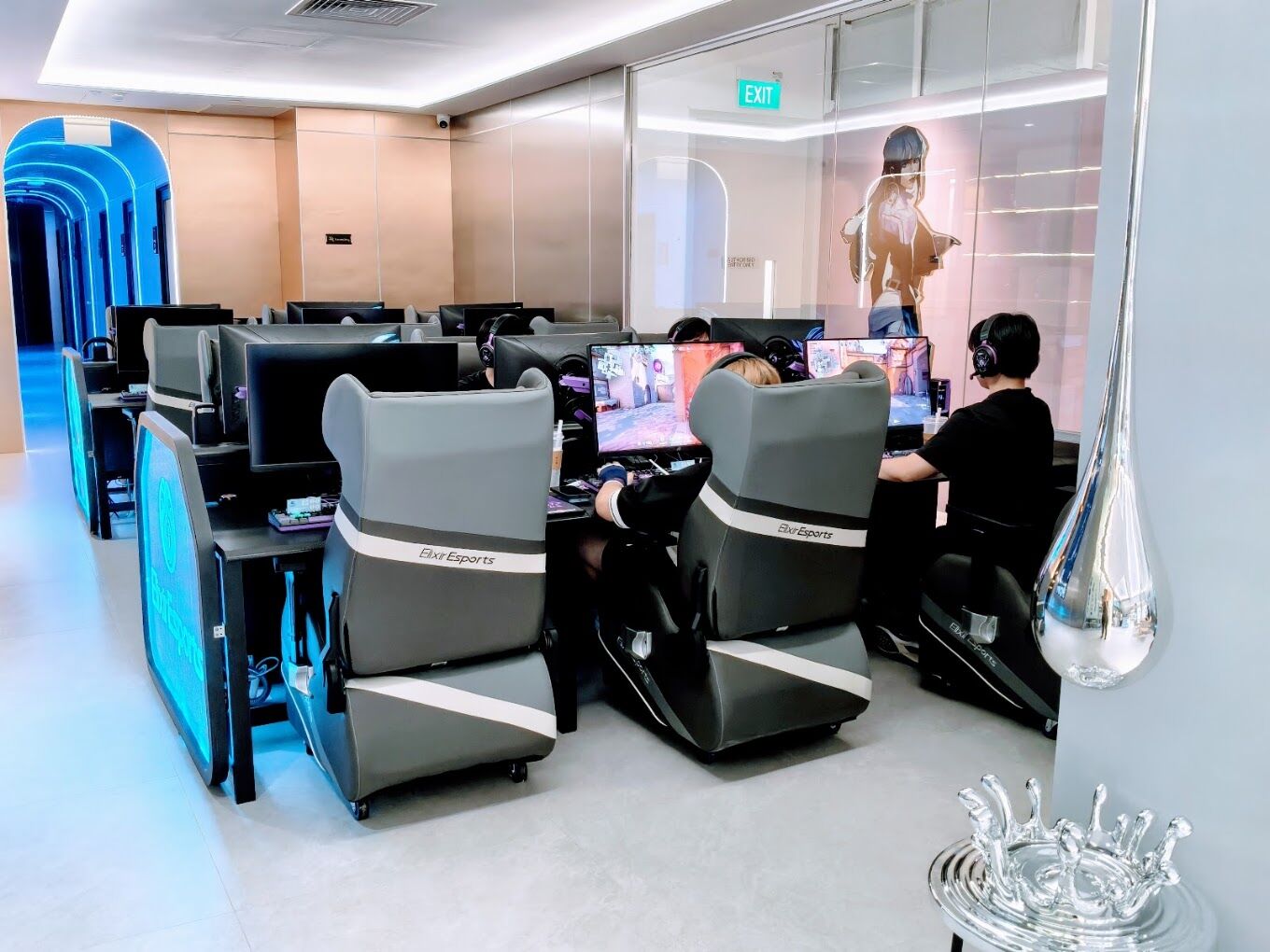 man gaing in Elixir Esports Cafe Singapore