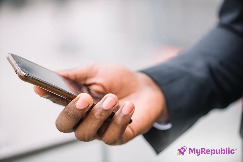 A Person Using Mobile Phone