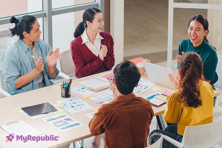 Image of a team meeting